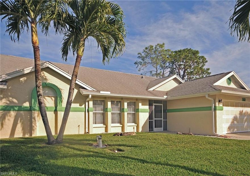 Come see this original Riviera Golf Estates model home- the best single family home buy in the community! Soaring ceilings, lots of natural light and big rooms welcome you in. A bright, inviting 400 square foot Florida room and wet bar say "easy living" and great entertainment for family and friends. Tile and wood laminate flooring with no carpet to replace for easy maintenance. Enjoy the spacious yard with palms and fruit trees ready for picking during the season. Owners added a well for irrigation which keeps the plants fresh and healthy and water bills down. For the convenience of East Naples combined with low HOA fees with a community pool, tennis courts, clubhouse and more, all for under $280,000 be sure to visit this one.