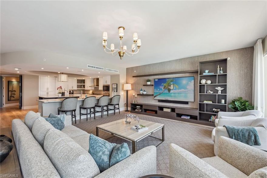 Live the best of Southwest Florida. This exquisite home offers the complete experience, giving you the best of all worlds, near to shopping, dining and entertainment galore, while providing a beachy world outside your window. The comfort of home, this one offers 4,131 square feet of luxurious space, all dressed and appointed to the highest contemporary standards, with wide-plank flooring in living spaces, lush carpets in bedrooms, and elegant designer tile and marble in baths. Highest fashion has gone into its every detail, with a grand kitchen ideally appointed for the chef or the casual eat-in lifestyle, all while gazing out across the magnificence of poolside living and views of Wiggins Pass and the Aqua marina. The home is offered furnished with recent refurnishing. Tease the life, with the neighboring Pelican Isle Yacht Club, or a slip purchase within Aqua’s own, you can take a boat shuttle to enjoy the day’s surf, or cruise to your own destinations of choice. It’s a grand life.