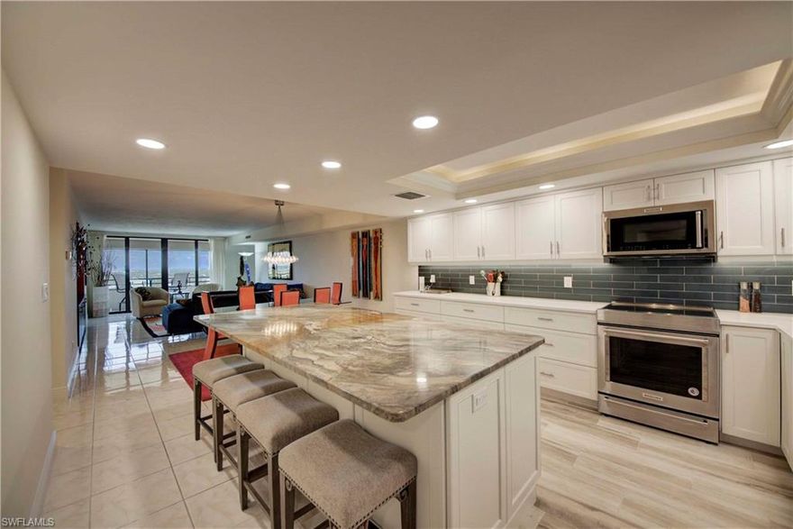 WOW!  STUNNING CUSTOM UPDATES! One of the most desirable FLOORPLANS!!  AMAZING RIVER-VIEWS..SUNRISE and SUNSETS from TWO MASTER SUITES with PRIVATE LANAI's.  Spacious THREE Bedroom, THREE Bath, SPLIT floorplan.  UPDATES INCLUDE:  TOTALLY Remodeled KITCHEN, with huge CENTER GRANITE ISLAND.  QUARTZ counters, TILE backsplash, UPSCALE cabinets, NEW Stainless Steel Appliances, Recessed lighting and walk-in PANTRY. BEAUTIFUL UPDATED MASTER BATH, HUGE WALK-IN CUSTOM closet, w/private lanai. Tile throughout. Plenty of storage!
The Landings Yacht, Golf, and Tennis Club is one of the most prestigious communities off McGregor.  Enter through the guarded gate, into lush landscaped grounds.  AMENTIES for all residents include: A BOAT-SLIP at the MARINA up to 60' (if available), UMLIMITED GOLF, TENNIS, PICKLE-BALL, BOCCE-BALL, TWO RESTAURANTS, FITNESS CENTER, CLUBS and DAILY ACTIVITIES.  Also Enjoy  "ARIEL" amenities:  HUGE POOL,
BBQ's, FITNESS CENTER, PRIVATE TENNIS COURTS, GUEST SUITES, BILLIARD ROOM, SOCIAL ROOM W/KITCHEN. You can have it ALL!