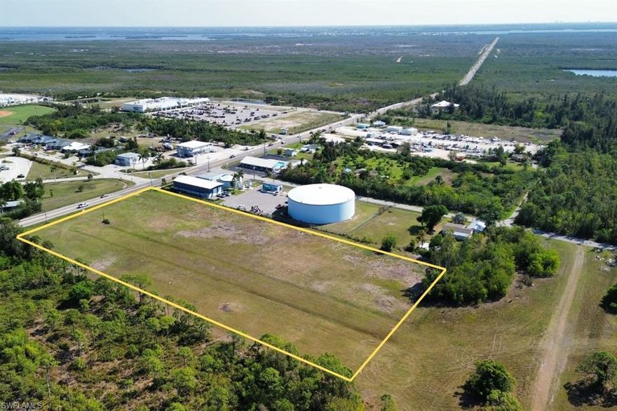 Prime opportunity in the heart of Bokeelia (Pine Island)!! This 4.78 Acre commercial parcel offers exceptional visibility and accessibility with over 300 ft. of frontage along Pine Island Rd. - one of the area's main thoroughfares. 

Zoned CC , CG, and CT , with a portion designated to TFC-2, this versatile property allows for a wide range of Commercial and mixed-use opportunities. Whether your looking to establish retail, office, service-oriented businesses, or a combination project, the zoning flexibility provides a strong foundation for your vision. 
Even better, Site plans have already been approved through Lee County for OPEN STORAGE BUSINESS , saving valuable time and expense-making this property truly SHOVEL--READY FOR DEVELOPMENT!

DON'T MISS THIS RARE CHANCE TO SECURE A HIGH - VISIBILITY COMMERCIAL SITE IN A GROWING AREA. 

CALL TODAY FOR MORE INFORMATION !!