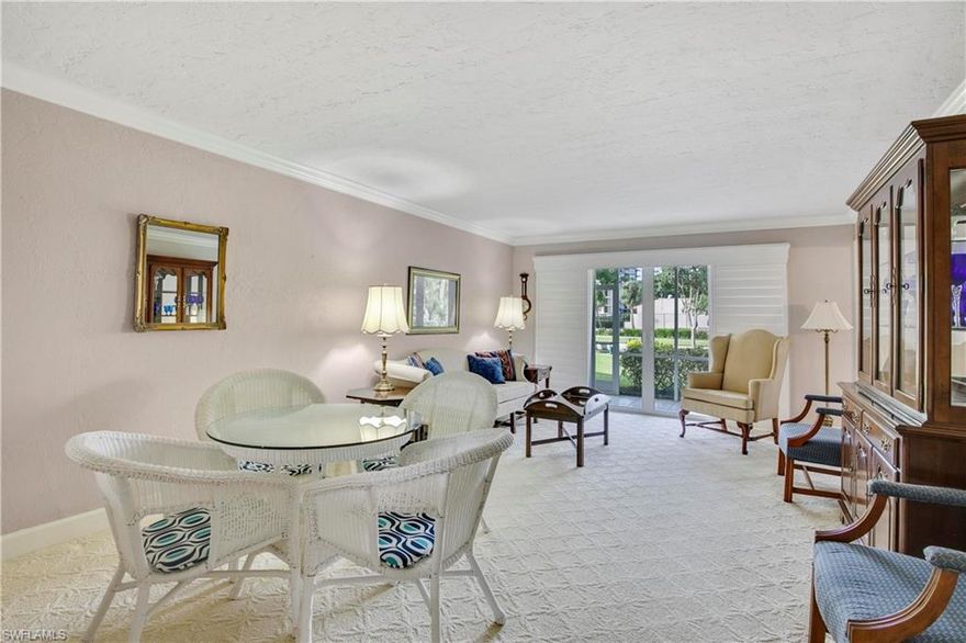 Location is the name of the game with this remarkable 2 bedroom, 2 bathroom condo located in the heart of magnificent Marco Island. French Village boasts incredible convenience; multiple beach accesses, Marco Walk Plaza, and several high-class hotel restaurants...all in short distance, beach accesses is 1/4 of a mile away. The relaxing living room benefits from Western exposure for pleasant sunny afternoons; head out the sliding door to the lanai on a nice day! Need a break from the sun? Plantation shutters provide an aesthetically pleasing solution. A fantastic set of French doors lead into the comfortable primary bedroom. Guest bedroom also touts size, with a king bed fitting handily. Primary bathroom comes equipped with a lovely updated shower. Ample kitchen with plentiful counter and cabinet space, open to the dining area. Covered parking with an assigned spot (#103) is included. Washer and dryer included in the unit. A/C installed 2015, hot water heater installed 2016. A popular common area, the sun deck represents a perfect vista to soak in some succulent sunshine and enjoy nightly sunsets. Other amenities include a sparkling pool, a barbecue area, shuffleboard, and a putting green for practicing your short game.  Be in the middle of it all with this Island home.