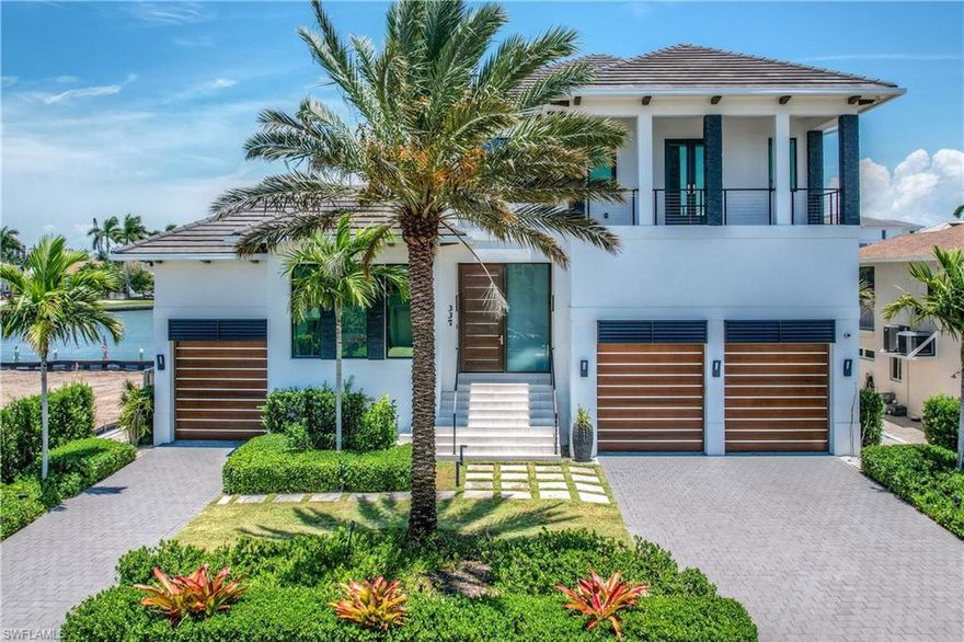 Live your dream in this beautiful home totaling 5,326 sq feet (3,5698 under air). This three-story tall home features a three-car garage, 4 bedrooms, 4 full bathrooms, 2 half-baths, a heated pool, boat dock, and breathtaking views of the canal. You can enjoy endless sunsets from your balcony, stroll down to the private dock, or sunbathe alongside the gorgeous pool. This new home was built in 2018 and has only been used intermittently as a vacation home. Some luxury features include European flooring, custom-made glass rail stairs with intermittent tread lighting, concealed air-condition vents, a private balcony from bedrooms, and an audio system throughout the home. Appliances include Wolf-induction stove top and two ovens plus a microwave and Elica hood, Jenn air refrigerator, & an Asko Dishwasher. Come see this gorgeous property and all it has to offer as your own piece of paradise