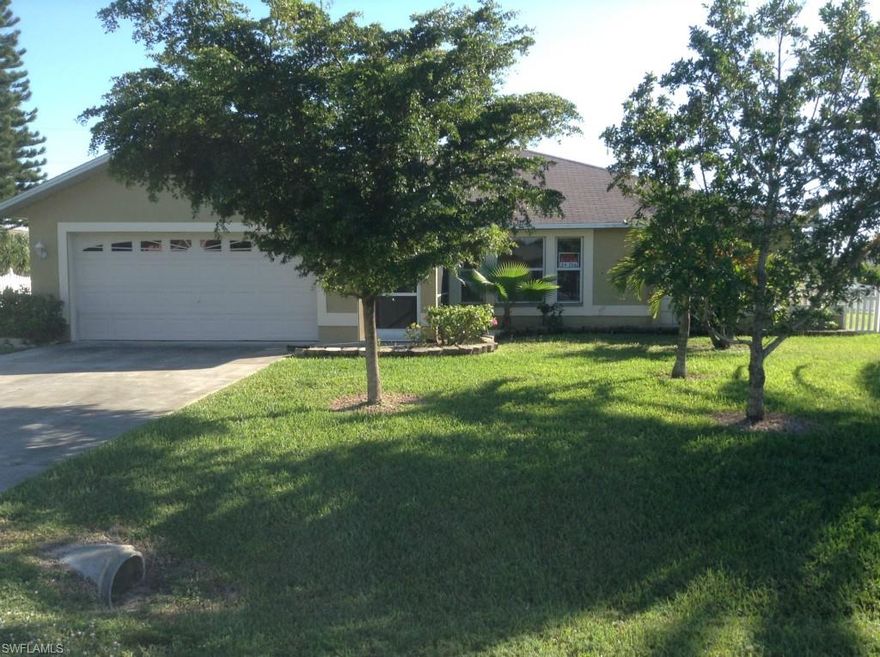 MOTIVATED SELLER, MAKE AN OFFER! NEW INTERIOR PAINT THROUGHOUT! Recently appraised at $184,000! Water, sewer, irrigation are all in and paid for! There are very few 4/2 homes for sale that can boast of that. This large home is built on a triple corner lot! The exterior is complemented by beautiful mature landscaping, a custom fenced in back yard, and plenty of room for a pool! The 4/2/2 home is very spacious, with an addition on the back of the house that could serve as an in law suite. The large master suite has two rooms. Come put YOUR finishing touches on this diamond in the rough. Location, location, location! This quiet, well established neighborhood would be a great place to move your family!