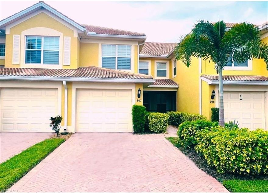 Freshly PAINTED Inside & Out.   5702 Mayflower Way, #307, Ave Maria, FL.  Del Webb of Naples -- BEST GROUND LEVEL VALUE in this community!!  Only a few steps from one of the pools!!! Egret Model Carriage Home, Ground Level End Corner Unit w/AMAZING GOLF COURSE & WATER VIEWS!  Under Truss, Covered/Screened Rear Lanai & Screened Front Entry! --1536sf Air Conditioned Living Space, featuring 2 Bedrooms +Den/Office, 2 Full Bathrooms, Breakfast Nook, Dining Area, Ceramic Tiled in Main Areas & Office, Pergo Wood Flooring in Bedrooms, Stainless Steel Appliances, Crown Molding in Kitchen, Living & Main Dining Areas w/Dimmer Controlled Soft Ambient Lighting. Water. Cable TV & High Speed Internet INCLUDED in dues!! Eastern Exposure Provides Premium Year Round Sunrises! AC system replaced 2018, Hot Water Tank replaced in 2020. This 55+ Active LifeStyle Community Condominium Complex is Complemented With it's Own Beautiful Exclusive Private Community Pool, Hot Tub, Restrooms & Grilling Area (Exclusive Only to Mayflower Way Condo Unit Owners). Walking Distance To South Park w/1 Mile Nature Walking Trail & Gazebo's, 2 Lakes and Dog Park. Semi-Public Panther Run 18 Hole Championship Golf Course is Close By. The Del Webb Oasis Club Resort Style Amenity Center features 2 Clubhouses, Golf Simulator, Pool Tables, Activity Director, Resort Style Pool, Lap Pool, Fitness Center, Sauna/Steam Room, Salon, Business Center/Library, Catering Kitchen, Community Patio w/Grill, TV, Fire Pit, Pickle Ball/Bocce/Tennis Courts.  Well managed Condo Association, no current special assessments w/plenty of reserve funds for future needs!!