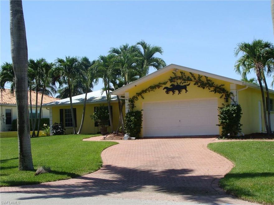 Wonderful homesite or original ranch home from 1974. Beautiful royal palm lined, dead end avenue with direct gulf access. Walk to third st and fifth ave and beaches. Surrounded by new homes. Great opportunity to build your dream home. Home has been renovated with newer kitchen and baths. Great rental potential. Boat slip and boat lift. Newer metal roof. Good home elevation. Tenant in place until June 1, 2021.