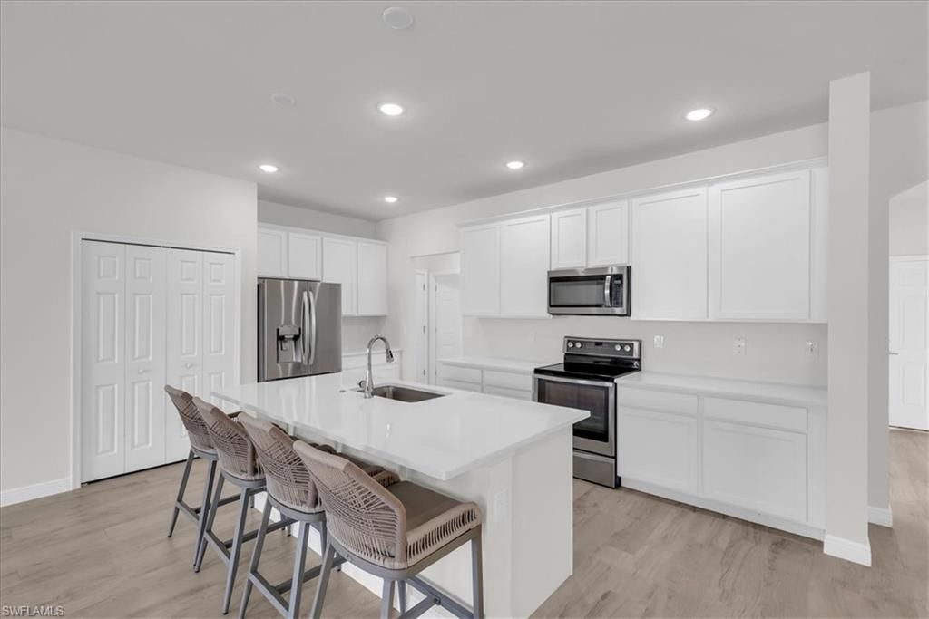 Photo of 4144 SW 9th PL, CAPE CORAL, FL 33914 (MLS # 225082911)