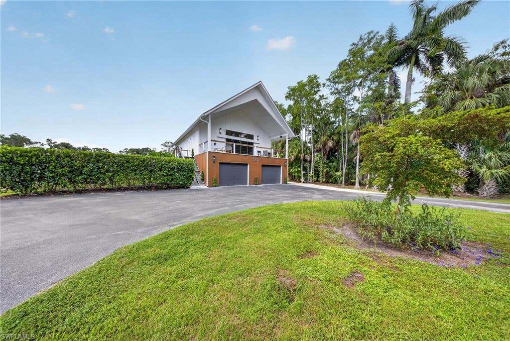 Photo of 5191 Coral Wood DR, NAPLES, FL 34119 (MLS # 226028144)