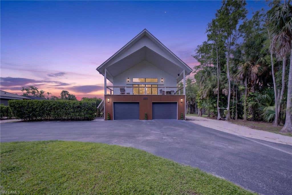 Photo of 5191 Coral Wood DR, NAPLES, FL 34119 (MLS # 226028144)