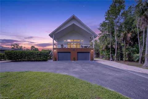 Photo of 5191 Coral Wood DR, NAPLES, FL 34119 (MLS # 226028144)
