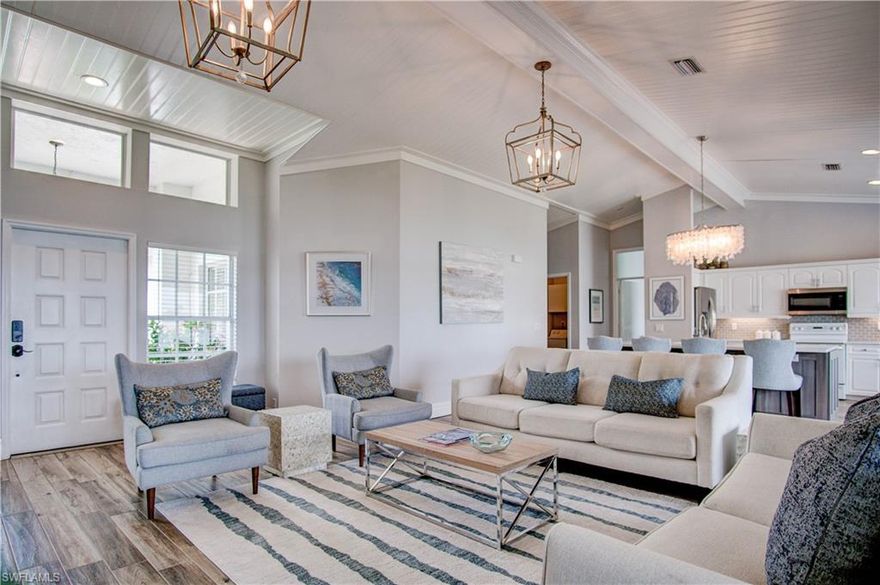 This beautifully renovated modern coastal home has a front-row seat on the lake, with amazing sunsets every evening! The screened lanai offers outdoor seating and dining. Outside, you can sit out by the lake and toast the sunset or enjoy the stars at night! A split floorplan with great room offers a privately located owner's suite with vaulted ceiling, walk-in closet and remodeled bathroom, Euro-glass shower, soaking tub, modern lighting and abundant storage. The kitchen has a huge island with quartz counters, stainless appliances and an eat-in breakfast area. Vaulted bead board & beamed ceilings give a light and airy look throughout. Located just ten min. from Vanderbilt Beach and five min. from Mercato, Emerald Lakes is a gated community known for its friendly residents. Amenities include a new pool, tennis and pickleball courts, fitness room, fishing dock and clubhouse.Turn key furnished. Small Dog may be considered, with owner approval and pet deposit. AVAILABLE APRIL 8-NOVEMBER. $4,500 per month.AVAILABLE DECEMBER THROUGH APRIL 2026/27 $8250 per month. All utilities, yard service and HOA fees included. Owner will provide beach chairs and towels, cooler,and bikes for tenant use. This is the best of Florida lifestyle!