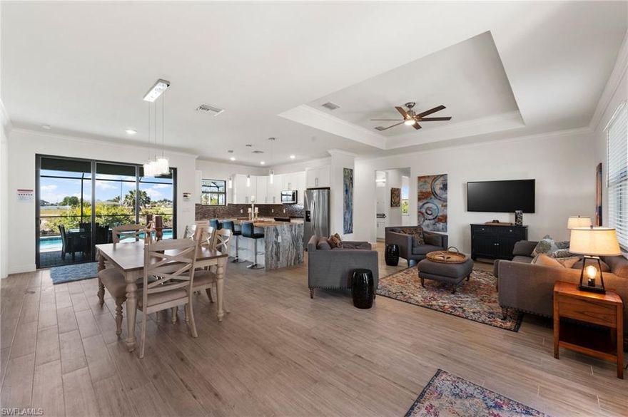 Welcome to your dream turnkey waterfront retreat in Cape Coral, Florida! This immaculate, fully furnished 4-bedroom, 3-bathroom home offers a private heated pool and backs up to a canal with direct access to the Gulf of Mexico—perfect for endless fishing, boating, and sunset cruises.

Built in 2022, this home feels like new and is located in the highly desirable NW Cape Coral area, close to top-rated shopping and dining. Step inside to a spacious, modern interior featuring an open floor plan ideal for entertaining and everyday living. The kitchen is a chef’s dream, complete with sleek cabinetry, stainless steel appliances, and granite countertops.

Relax in the luxurious owner’s suite with peaceful canal views, while three additional bedrooms provide comfortable accommodations for family and guests. Outside, enjoy year-round relaxation on the screened lanai with your private heated pool. Just beyond, the backyard leads to the canal, where your boat is ready for Gulf access adventures.

Turnkey and fully furnished, this home is move-in ready—just bring your suitcase and start living the Florida lifestyle!