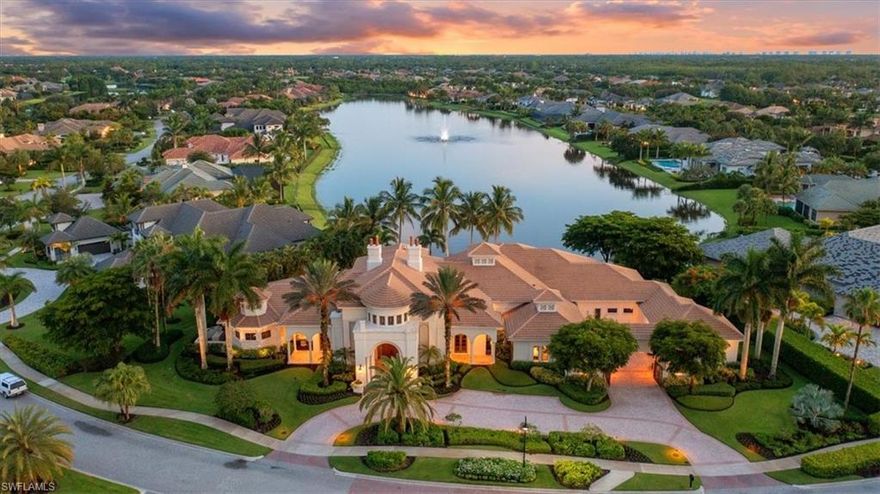 H6596- Cross the threshold of one of the most magnificent estates in Quail West, and you’re met with sparkling water views reaching to the horizon. From the gleaming floors to intricate architectural detail and views everywhere, this elegant McGarvey built home is winner of 2 Sand Dollar awards and a BIA Pinnacle award. Situated in one of the most desirable locations in the community, the smart layout will delight at every turn. The heart of the home is an enormous well-appointed gourmet kitchen with plenty of island space that makes it easy for hosts and guests to gather. Combine that with a wine room, separate wet bar and open great room for endless hospitality. A wing of bedrooms is separate from the master which features his/her baths and custom closets. Two studies, formal dining and living rooms, a second master suite with sitting area plus a gym/bonus room makes this home unsurpassable. The welcoming screened lanai features separate gathering/dining spaces, fireplace, pool, spa and AMAZING day and sunset views. Freshly painted interior and exterior, New Roof, whole house generator and more for quintessential estate living.