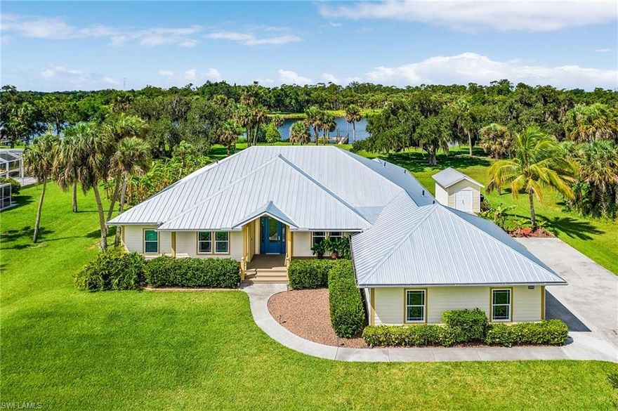 Rare Opportunity!! Beautiful riverfront Alva property on over half an acre where all your
dreams can come true! This immaculate home has so many unique features you just
have to tour it to see. Stepping in to the foyer you will see the formal dining for
entertaining or take a seat at the breakfast bar or eat in kitchen for meals with family
and friends. The primary suite has an extra sitting room/sunroom that can be used as a
reading room, office, or just enjoy the morning views of the river with your coffee. The
2nd bedroom is a guest suite with its own entrance to the pool area and small area
for a kitchenette. The den/office has an oversized closet for any storage needs. The 3 rd
bedroom also has a private entrance to the guest bathroom. The large living room
showcases a stone fireplace for those few chilly Florida nights. Step through the French
doors onto the "pavered" patio area and take a dip in the saltwater pool or relax in the
spa as you listen to the waterfall cascade into the pool. The full panel screens give you
amazing views of the Caloosahatchee River to enjoy the incredible sunrises and
sunsets. Take a stroll onto the dock, load up and take out the boat or enjoy the other
watercraft as they play in the river. Fruit trees, cul-de-sac, 2 car garage, and outdoor
storage are also extra features.