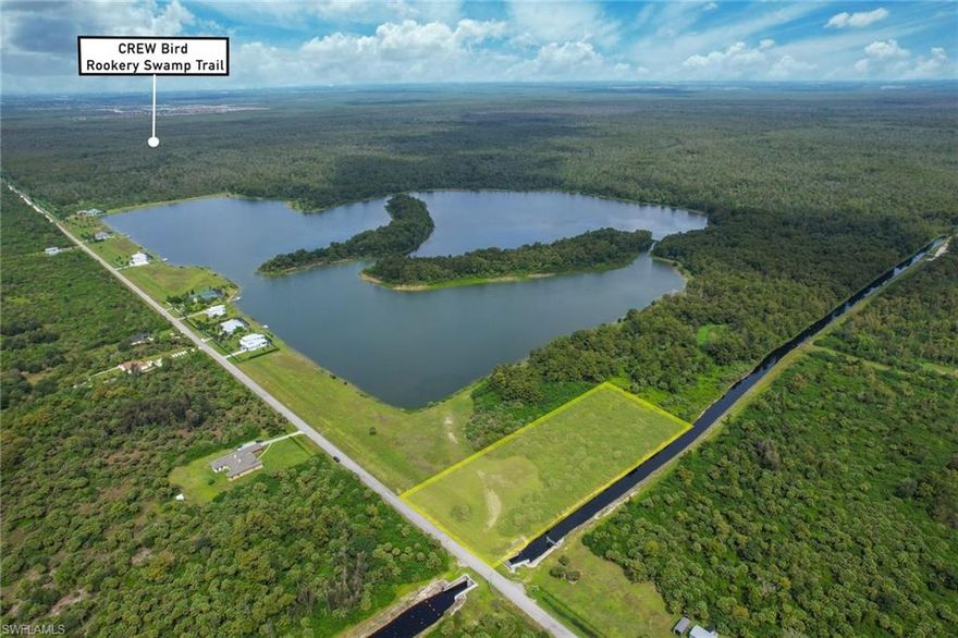 PRIVACY BEAUCOUP! 3.63 acres, 100% uplands, borders 640 feet of the freshwater canal, and ready to build next to recent new luxury homes. This exclusive "Deed Restricted Community" of only 20 homesites is surrounded by their private 150-acre quarry lake, all with deeded boat access. If that's not enough, it adjoins a 60,000 acre Crew Bird Sanctuary with 12 miles of walking or biking trails to see Florida nature at its finest. What's close by you ask? Only minutes away from the Publix shopping plaza, public and private schools, and Phase 1 of Collier County's new  "Big Island Regional Park"! Spanning 150 acres with Community and Aquatic Centers, Event Lawn with a stage for outdoor concerts, 4 multi-purpose Athletic Fields, 2 Concession Pavilions, 2 Basketball, 2 Tennis, and yes 6 pickleball courts! Looking for some lagniappe? Lot acquisition, custom build, and end loan financing could make this an easy decision in addition to a selection of the best builders in town!