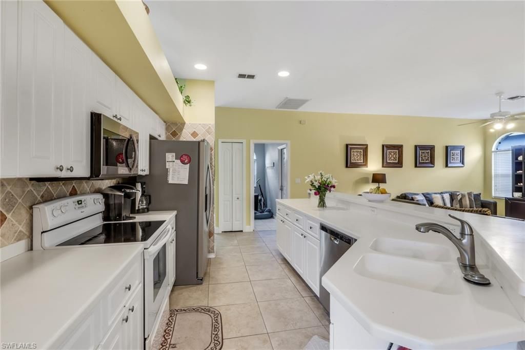 Photo of 977 Briarwood BLVD, NAPLES, FL 34104 (MLS # 225082258)