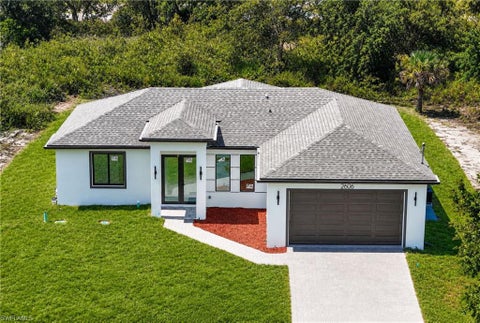 Photo of 2606 63rd ST W, LEHIGH ACRES, FL 33971 (MLS # 226024055)