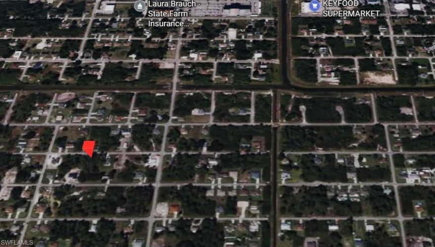 Excellent opportunity to own a vacant lot in Lehigh Acres. Located in a developing area with new construction nearby. No HOA and easy access to main roads, shopping, and schools. Ideal for building or investment.