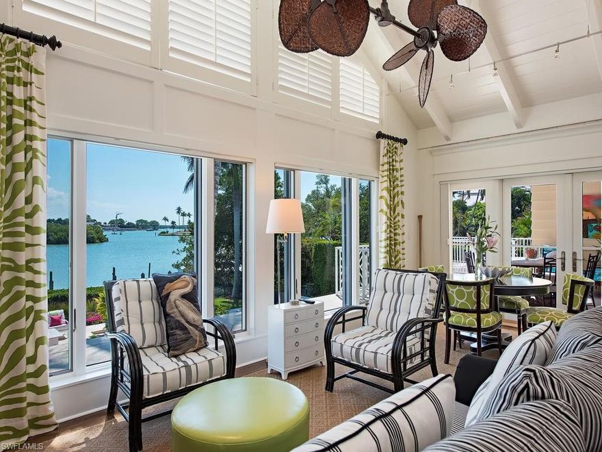 Exquisite "move-in" condition 2010 renovation:  Main house + guest house.  THIS PROPERTY IS OFFERED FURNISHED.  * PRIVATE BEACH ACCESS ACROSS THE STREET! * Enjoy a spectacular very private domain fronting serene expansive waters of Champney Bay with views to Doubloon Bay!  (Site: 300+ - 373 ft. depth) Exacting attention to details have been lavished on this residence of "picture-book" evocative charm.   Builder: Boran, Craig Barber & designer Dan West.  The driveway spans 250 ft. from Gordon Drive to the residence.  The location affords easy direct "bridge-free" access to the Gulf of Mexico.  109 ft. of water frontage.  80 ft. deepwater dockage with snook lights, water & electricity, & 20,000 electric lift.  Charming screened fish cleaning station.