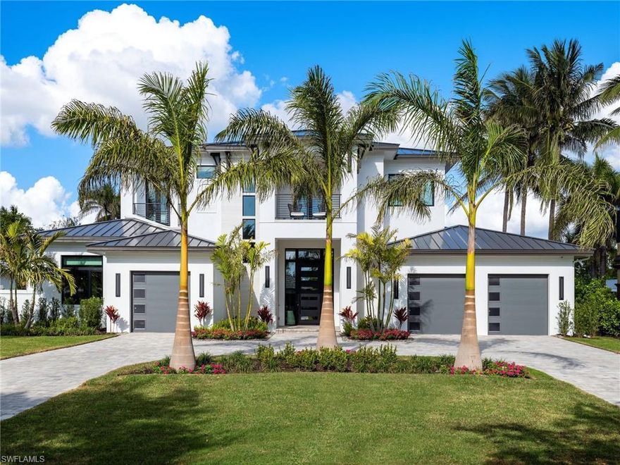 Discover the ultimate blend of coastal elegance and modern livability in The Lismore II by Florida Lifestyle Homes, a brand-new, private beach access residence situated in the exclusive Park Shore enclave of Naples, FL. Designed for those who appreciate timeless craftsmanship and everyday comfort, this 5-bedroom, 5.5-bath Executive home offers nearly 6,500 square feet of total living space, including a flexible bonus room, a private study, and an expansive second floor accessed by private elevator. Enjoy your large bonus room, which can be a 6th bedroom, movie room, or art studio—the possibilities are endless. All bedrooms are ensuite, ensuring comfort and privacy for family and guests alike.

Relax on your large second-floor balcony that faces south, capturing warm coastal breezes off the Gulf. At the heart of the home, the chef’s kitchen pairs sleek Miele appliances—including a built-in Miele coffee machine offering espresso, cappuccino, and other options—with custom cabinetry and a well-appointed butler’s pantry that can be used as a second kosher kitchen, ideal for effortless entertaining. A climate-controlled wine cellar caters to collectors, while the indoor spaces are elevated by healthful natural light, soaring ceilings, and custom architectural details you won’t find elsewhere.

Outside, the home transforms into a private retreat. A resort-style saltwater pool with swim-up bar stools, a separate spa, and a fully equipped outdoor kitchen create a setting designed for relaxation or lively gatherings with family and friends. Enjoy al fresco dining on your lanai, enhanced by electronic roll-down screens that provide comfort and privacy at the touch of a button.

Additional features include a second laundry room on the upper level for added convenience, a spacious split three-car garage, and a comprehensive alarm system with four security cameras and a backup memory system for peace of mind. With refined finishes throughout, this residence is both a showpiece and a sanctuary—ready to welcome its first owners into one of Naples’ most desirable coastal neighborhoods.