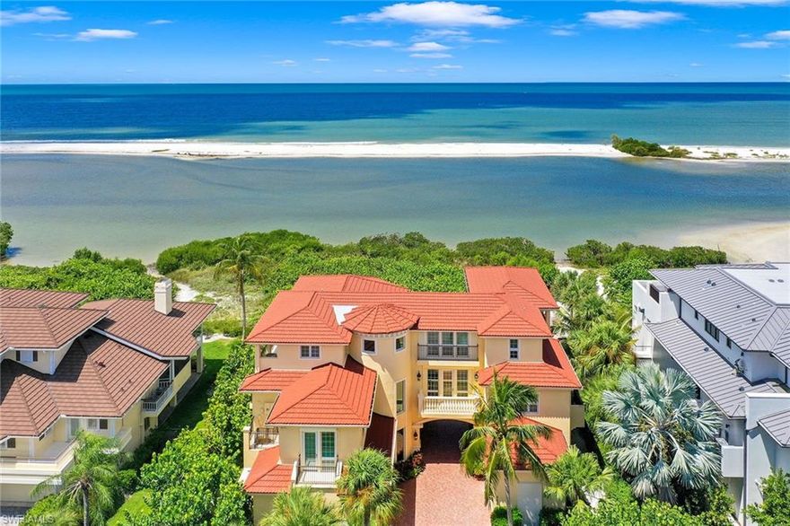 A breathtaking Architectural Masterpiece sitting on the Gulf of Mexico with unequivocal western Gulf and beach views! Boasting over 4690 SF under air, and approximately 9618 total SF of unsurpassed quality and wood craftsmanship throughout.  Never miss another sunset from one of eight beachfront terraces with endless views! Perfection at its finest with 3 living levels complete with elevator and dramatic sweeping staircase. Open concept Great room with 15' ceilings and transom windows all open to Gulf and Beach. Open gourmet kitchen with double wall ovens, stainless steel appliances, granite counters and breakfast bar. Family room on second floor comprises of sunrise and sunset balconies. Third floor entertaining room with absolutely stunning views complete with wet bar for entertaining. Beautiful bamboo and tile flooring throughout. This resort style residence has 4 bedrooms and 4 full baths, room for the whole family to enjoy this legacy property. 3 brand new Air Conditioners put in this year! Located in Prestigious 24 hr. gated community on the Gulf of Mexico with world class amenities. Built for the most discerning buyer, you will not be disappointed.