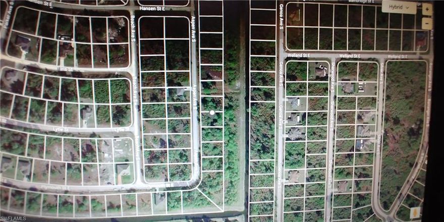Beautiful Lot with a canal view.  This is a quiet area of Lehigh Acres yet close to access roads, shopping and restaurants.  There are no HOA fees and this is not in a Special Hazard Flood Zone.  This lot is large enough for your estate home and a pool.