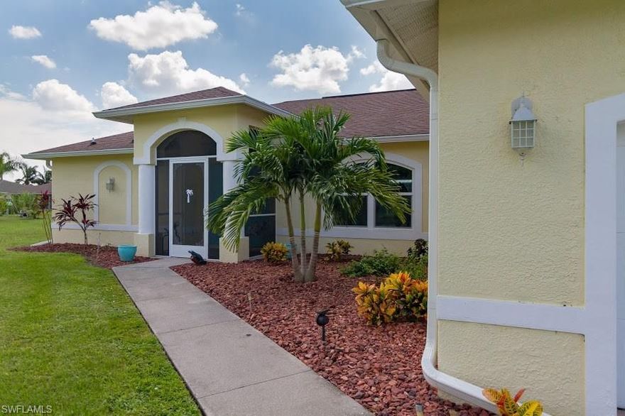 New Pool! This beautiful, immaculate, all tiled home is a GREAT value and in excellent condition with many upgrades.  Fully pocketing, triple lanai sliders truly bring the outside in.  Beautiful  pool, cage, and paver deck just added recently.   Saltwater pool and electric heat pump!    Also  newer are:   Stainless steel appliances, washer, dryer, gutters, storm protection, and landscaping.    Storm protection includes:  impact glass on large front window, accordion shutters on other windows, and Storm Smart roll down fabric shutters on lanai.  The new shed is also included and is movable.  The inside and outside  both have a new coat of paint.  The home is located in the southern part of "Gator Circle" and is close to shopping venues.  Very nice residential area.    No flood insurance required and owner is including a one year Home Warranty  -  No problems here during the last storms.