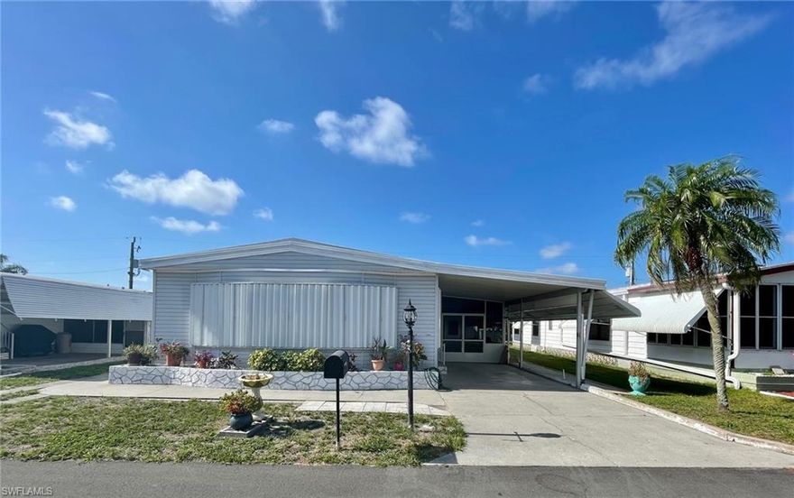 Welcome to Tamiami Village! SPACIOUS fully-furnished double-wide now available! Own your land AND this ready-to-move-in home Ideally located near one of the three community pools in this people-friendly, pet-friendly 55+ community with low monthly fee of $209. So much space to relax in the Sunshine State~~Living room, dining room, family room, kitchen, 2 bedrooms and 2 full baths. Ample closet space throughout. Roof 2018. Washer & dryer conveniently located in the breezeway shed. Storm shutters all around for weather protection, energy savings, and security. SPECIAL FEATURE: 10'x10' extra air-conditioned space behind the breezeway would make an ideal "safe roof" during a storm, "man cave," or craft & hobby workshop! Enjoy the many well-maintained amenities including 3 swimming pools, spa, 2 shuffleboard courts, horseshoes, 2 billiard rooms, 2 clubhouses, fitness center, library and a variety of social activities. Conveniently located across from the Shell Factory entertainment center and just minutes to excellent restaurants, shopping, health care, and the Fort Myers River District!