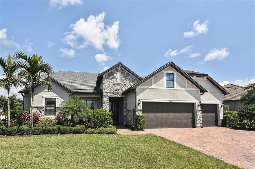 If your looking for a beautiful move in ready home then look no further.  This Club View model home has it all. 
As you enter this home through the double front doors with glass inserts, the large entrance invites you into the spacious open concept living space.  There is crown molding throughout, solid core doors and porcelain tile flooring throughout except for the bedrooms. The coffered ceilings in the family room, master bedroom and office add depth to the already high ceilings. The gourmet kitchen has a large center island, decorative range hood and wine cooler making this a chefs delight. The office with a quartz top desk and the large custom laundry room with granite counter tops offer custom cabinets for storage and organization. Spend your time relaxing on your lanai with a unobstructed view of the lake next to your beautiful  heated pool and spa with an alternating light show.  The outdoor kitchen that includes a Twin Eagles grill with vented exhaust, refrigerator and sink is ready when outdoor cooking calls.  The three car garage has a four foot extension and custom floors.  This home is waiting for you to view - you won't be disappointed.