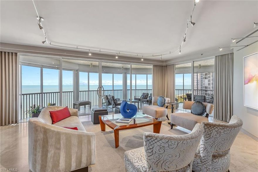 Discover a one-of-a-kind luxury residence with year-round sunsets and panoramic views stretching from Sanibel to Park Shore. Masterfully renovated by Kurtz Homes, this four-bedroom, 5.5-bathroom is a rare double unit in Bay Colony. A 10th floor, mid rise penthouse that blends elegance, functionality and awe-inspiring vistas. Exquisite craftsmanship includes custom millwork by Thomas Riley Artisans Guild throughout and in dual private offices/dens. Dramatic floor to ceiling glass doors lead to 5 expansive waterfront patios. The Gulf front owners suite offers dual baths with walk-in closets, a sliding mirrored wall pockets to extend the natural light and gulf views into the bath and dressing rooms. Stunning stone surfaces cover custom designed cabinets, showers, and jacuzzi bath. Entertain effortlessly in the open-concept chef's kitchen, showcasing striking granite countertops, custom cabinetry and high-end appliances, along with a secondary prep kitchen for seamless hosting. A 340-bottle wine room and private home theater with 10 leather recliners and a 75-inch TV complete the space. The largest available poolside cabana, newly renovated in 2024, is designer-furnished for ultimate relaxation. With four parking spaces, two storage units, and access to beachside pool/spa, fitness center, exclusive tennis courts, guest suites and 24-hour security, this Bay Colony retreat is simply unmatched.