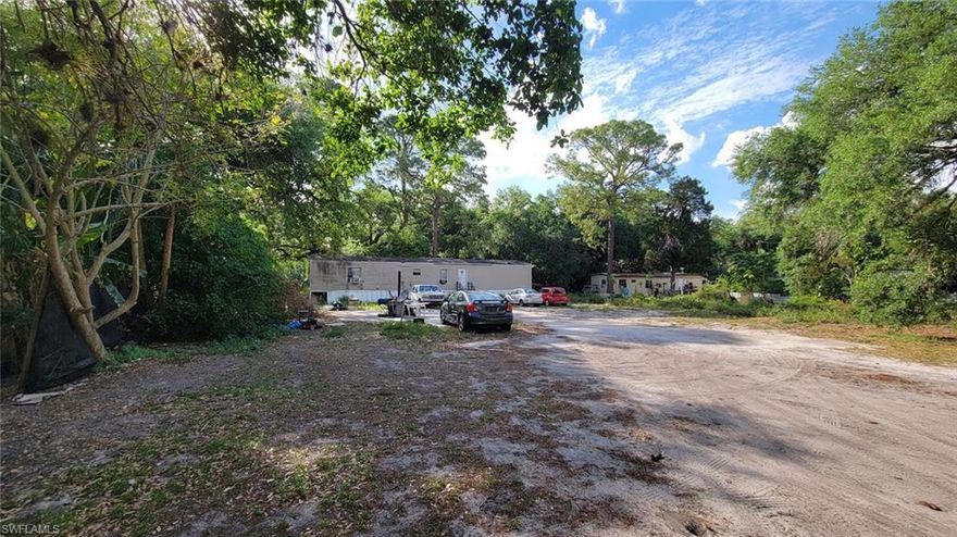 Affordable investment opportunity or a beautiful 1.45+/-acre homesite for your new dream home! This 3-bedroom 2 bath home is currently rented on a month-to-month basis. (Cash offers only)
