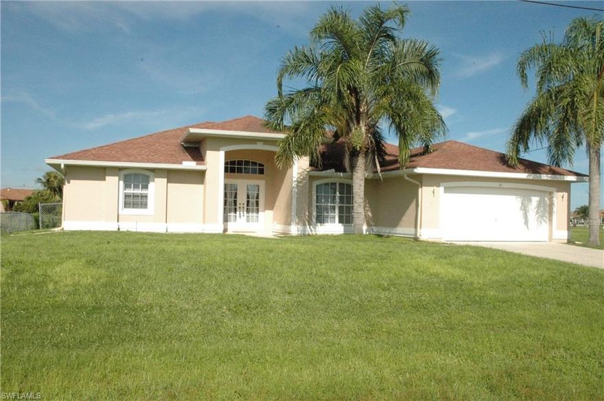 This beautiful 3 bedroom, 2 bathroom home is located in a very popular area of NW Cape Coral.  The home features granite countertops, tile floors, 3 sliding glass doors that lead to a large screened, new exterior paint, new A.C., large master with walk in shower and big closet,