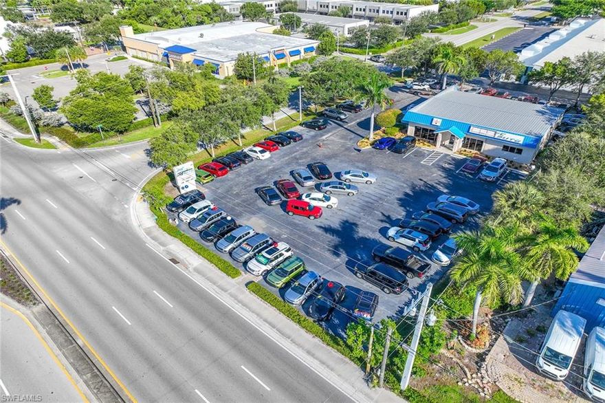 J and C Auto Sales presents a rare opportunity to acquire a well-established used auto dealership and finance operation with real estate, inventory, and income-producing infrastructure in place. Located on a prominent C-5-zoned, 0.86-acre corner parcel with 54,000 vehicles passing daily, the property offers exceptional visibility, access, and signage on a high-traffic corridor.  The offering includes a 3,951-square-foot building with three service bays, professional offices, and customer-facing showroom areas. Also includes vehicle auto inventory and a fully equipped service shop. The affiliated Collier Auto Finance Company generates verifiable receivables of approximately $5 million annually, and the finance arm is licensed and in good standing with the state of Florida.  This turnkey operation has served the Southwest Florida market for over 30 years, boasting a loyal customer base, diversified revenue streams, and growth-ready infrastructure. All staff are expected to remain post-sale, and the seller is willing to assist in a transitional role. Buyers may assume existing financing contracts, offering seamless income continuity.  Ideal for automotive operators, strategic investors, or commercial buyers seeking a profitable entry or expansion in the sector.