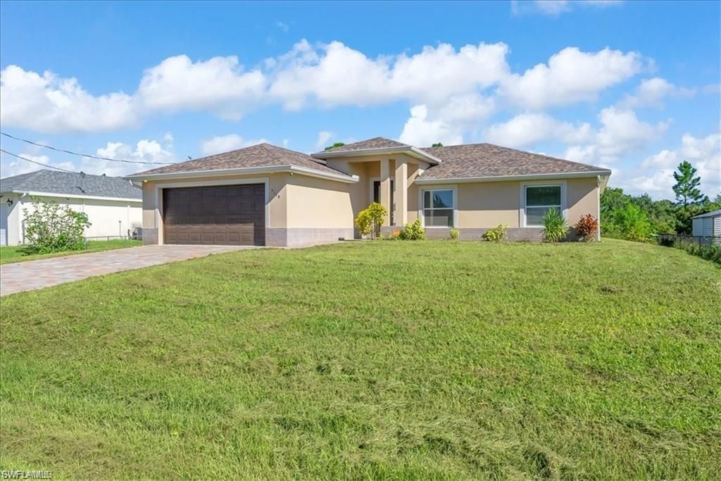 Photo of 3110 42nd ST W, LEHIGH ACRES, FL 33971 (MLS # 226016212)
