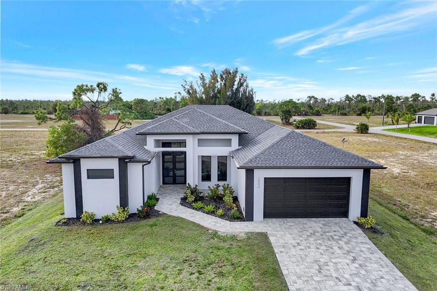 Experience new construction living in one of Northwest Cape Coral’s most vibrant growing areas. This modern home offers an open-concept floor plan with split bedrooms, tile flooring, impact-resistant windows and doors, and a covered patio with room for a future pool.

Just minutes from Crystal Lake Park, residents can enjoy a community destination featuring a sandy beach area, playgrounds, picnic pavilions, walking trails, and bicycle paths — creating a neighborhood feel with outdoor recreation right at your doorstep. Crystal Lake Park has quickly become a local gathering place with scenic lake views and plenty of space for relaxation and activity.

Northwest Cape Coral continues to see thoughtful community enhancements, including expanded trail systems, parks, and planned neighborhood connections that encourage active living and connectivity. This location is ideal for those who appreciate access to outdoor amenities, new infrastructure, and the ongoing evolution of one of Cape Coral’s most promising zones of growth.

City water and sewer, no HOA, and new construction quality make this home a comfortable and convenient choice in a dynamic community.
