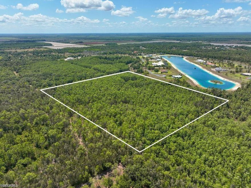 Incredible Opportunity to Own 22+ Acres in Estero! Located just 10 miles east of I-75 at the south end of Happy Dale Lane, this expansive property offers over 22 acres of land zoned AG-2 — perfect for equestrian lovers, as horses are welcome! Situated near Corkscrew Road in the desirable DRGR land use area, the zoning allows for one home per 10 acres. Best of all, this parcel lies in Zone X — NOT in a flood zone!  Absolutely beautiful and location, location, location!