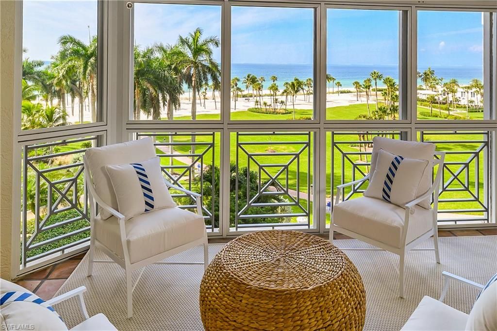 Photo of 4021 Gulf Shore BLVD N #403, NAPLES, FL 34103 (MLS # 225081339)