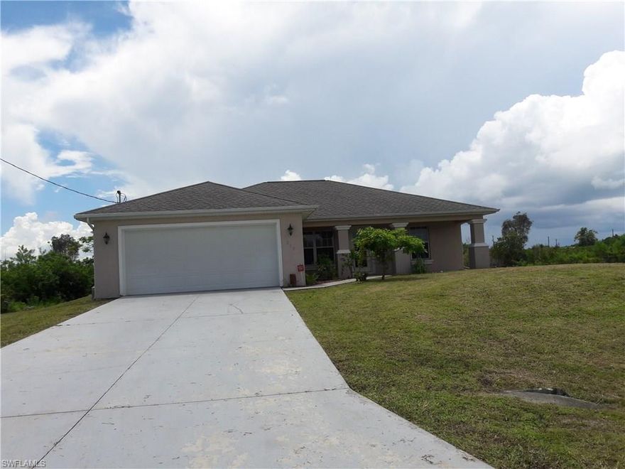 Attention First time home buyers or investors! This home is priced to sell. This Charming 3 bedroom, 2 bath, 2 car garage home is located of SR 82 and is centrally located to all conveniences. This home is on a gorgeous lot and even though it's in the city, there is a rural feel. This is an open floor plan with a large open kitchen.  This home has been well maintained but had tenants in there previously so a little TLC needed. The seller is motivated and selling as is. Will Qualify for all types of financing. Call today for your private showing.