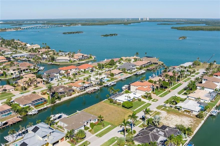 Calling all boaters. Looking to build your custom home on fabulous Marco Island? Look no further, this large direct access homesite has 100 feet on the water. It is a great location for power or sailboats with no bridges. Only six houses from the Marco River and the best boating in Southwest Florida. Fantastic location surrounded by luxury homes and close to everything Marco has to offer, including the beach, shopping, restaurants, schools and more. Don't let this one get away!