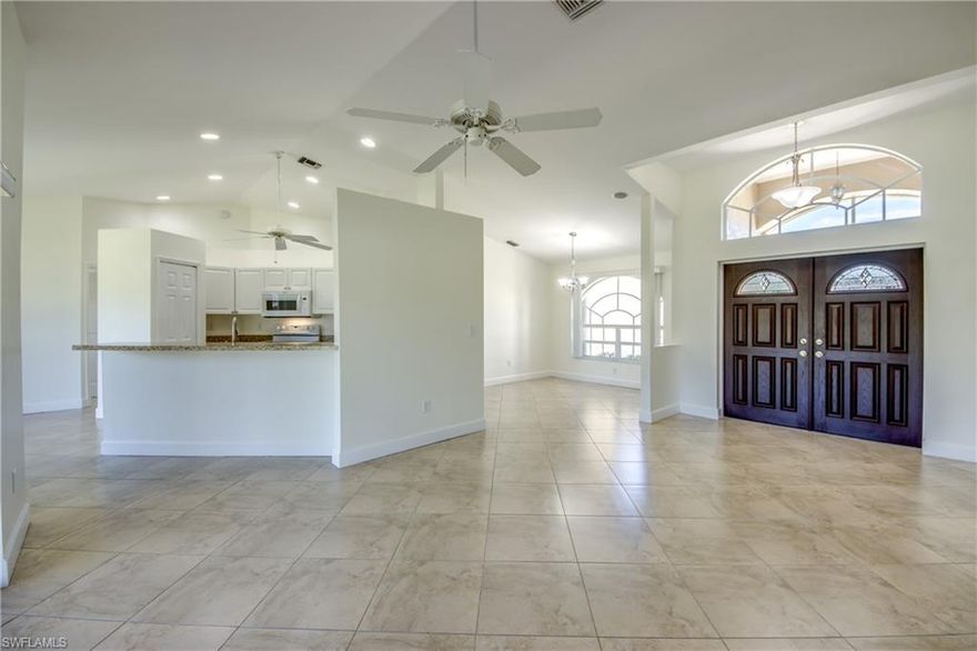 *MOVE IN READY* ASSESSMENTS PAID* FLOOD ZONE X* Step inside this Immaculate 3 Bed 2 Bath 2 Car Garage home with split bedrooms. Whether you are a first home buyer or looking for a Successful Investment Property, THIS IS IT!! This home offers Lush Landscaping, a Large Beautiful Screened in Entry Way with French Doors.  The vaulted ceilings with recessed lighting make the home feel large and inviting. Situated on an Oversized Corner Lot with plenty of room for a pool! The backyard is completely Fenced in with a Double gate ready to store all your toys!!  The kitchen is perfect for cooking and well equipped with all appliances included.  Friends and family will enjoy sitting around the counter while you cook a fantastic meal! This home offers an Eat in breakfast nook and Formal Dining Room! You will love the large screened in Lanai to enjoy those stunning Florida sunsets! Accordion Shutters are included for added protection! This home is tucked away in a quiet neighborhood yet close to everything you need whether it be Grocery, shopping, Amazing Restaurants, Hospitals and Schools!! It is minutes in either direction to Veterans Parkway and Pine Island Rd.  UPGRADES GALORE: NEW ROOF 2018 * NEW WATER HEATER 2020 * NEW WASHING MACHINE 2022 * NEW HVAC 2023 * NEW REFRIGERATOR 2025 * FRESHLY PAINTED INTERIOR * NEW SPRINKLER HEAD REPLACEMENTS & TIMER BOX 2025 * MASTER BATH/SHOWER REMODEL * NEW KITCHEN/BATH SINKS & FAUCETS 2025 * ADT ALARM SYSTEM! Do not miss your opportunity to OWN this HOME TODAY!!