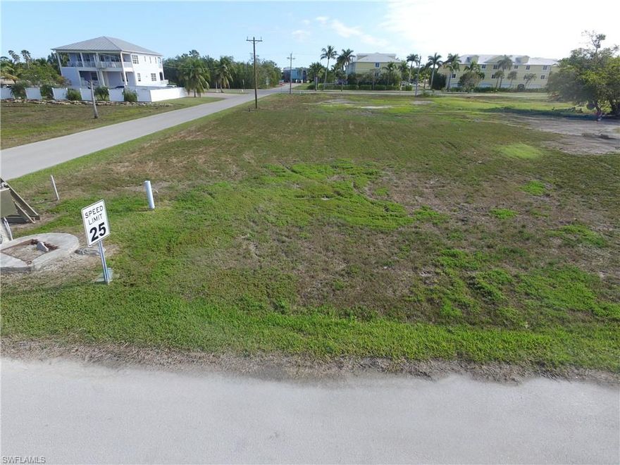 This oversized 0.34-acre corner lot in the historic and peaceful community of Everglades City offers the perfect opportunity to build your dream
home or invest in a property with exceptional potential. With no HOA restrictions, you have the freedom to design a custom-built residence or place a manufactured home that suits your budget and lifestyle. Located in a quiet, close-knit neighborhood, this property is just a short walk from charming local shops, popular restaurants, and a community park featuring tennis and basketball courts. Families will appreciate the convenience of a well-regarded local school within walking distance. Enjoy the best of both worlds with serene surroundings. Only 30 minutes from the upscale amenities of Naples. For outdoor lovers, the property provides unparalleled access to the renowned 10,000 Islands, offering endless opportunities for boating, fishing, and exploring pristine beaches and natural wildlife. Spend your days catching fresh fish and crabs or simply relaxing in this hidden paradise. Whether you're planning to build a private escape, or build an investment property, this rare oversized lot is full of possibilities. Don’t miss this chance to own a piece of Everglades City’s unique charm.