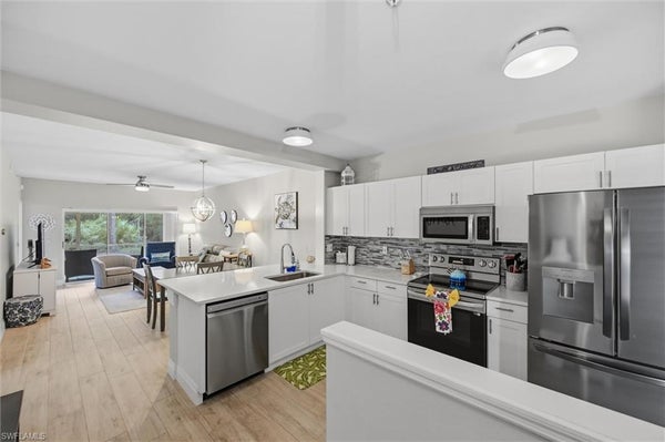 9165 CELESTE DR UNIT 103, NAPLES, FL 34113 - Image 95e75c052daeed06424f052d7cd33084/3459179247