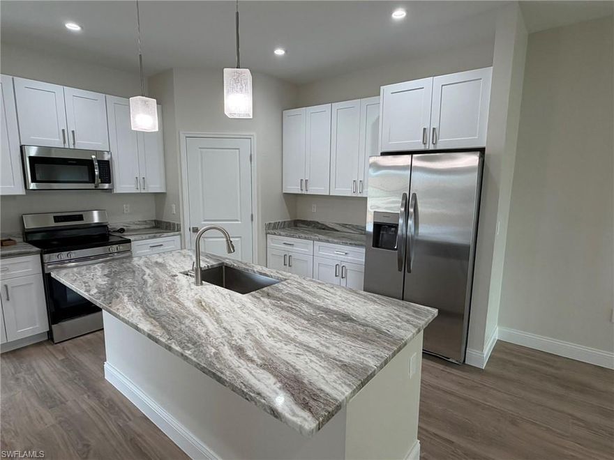 Not your average rental duplex!
Welcome home to this beautifully designed 3-bedroom, 2-bath residence offering 1,402 sq. ft. of spacious living under air — plus your own private 2-car garage. Each unit features its own unique, high-end finishes and a thoughtfully designed layout that provides both comfort and functionality.
Enjoy volume ceilings in the main living areas that create an open, airy feel, along with impact-resistant windows for added safety and energy efficiency. The oversized kitchen is perfect for cooking and entertaining, complete with full walk-in pantry, level 3 granite and quartz countertops, and ample cabinet space. You'll also appreciate the dedicated walk-in laundry room for added convenience.
Additional features include LED lighting throughout and ceiling fans in every room to keep you comfortable year-round.
Located in a fantastic central area of Cape Coral, this home offers easy access to shopping, dining, schools, and major roadways — making everyday living simple and convenient.
If you're looking for a high-quality rental with upgraded finishes, energy-efficient features, and plenty of space to live comfortably, this is one you won’t want to miss.