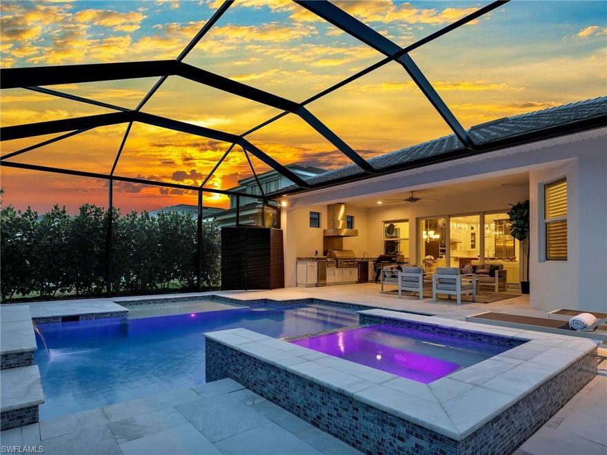 Huge Price Adjustment! Great Opportunity to live your best life in this gorgeous, elegant coastal dream home! Like New Construction! Stunning Designer finishes throughout this sophisticated modern show home! Boasting 3 Bedrooms, a private den/home office, and 2 Full & 1 Half baths, showcasing a luxurious, expansive floor plan, seamlessly integrating indoor & outdoor living, ideal for entertaining on the extended covered Lanai & poolside oasis! You'll find an array of high-end upgrades throughout this gorgeous home. The elegant foyer will be wowed upon entry, showcasing a picture-framed wall and marble tile flooring, highlighted by the high ceilings, and flow throughout the home. Enjoy the dream kitchen boasting floor-to-ceiling custom cabinets, glass-lit top cabinets, a large center island with stunning Quartz counters, professional series appliances, a Sub-Zero refrigerator, a Farmer's sink, a dining area & a fabulous wet bar with Quartz counters & wine cooler to entertain guests! Centering the room is a custom built-in TV console & designer lighting throughout. The private primary suite has two walk-in custom-organized closets, an opulent spa bath with tile surround, a glass framed shower & inviting soaking tub to relax and unwind. A home office/den is quietly located behind French glass doors & the two guest suites with full & half bathrooms are quickly tucked away for privacy. The sliding glass doors transition the indoors to the outside lifestyle, featuring a covered lounge area, outdoor grilling kitchen & stunning pool & jacuzzi, completely screened-in for ideal relaxing & entertaining while enjoying peace and tranquility. The 2-car garage has two charging stations for electric cars & additional storage space with epoxy-finished floors. Smart home technology, surround sound, home security, & hurricane-impact windows & doors and solid core doors. Nestled in the highly desirable community of Azure at Hacienda Lakes, a guard-gated community with luxurious amenities. Azure is just a few miles from Naples & Marco Island top beaches, golf courses, nature preserves, dining & shopping.
