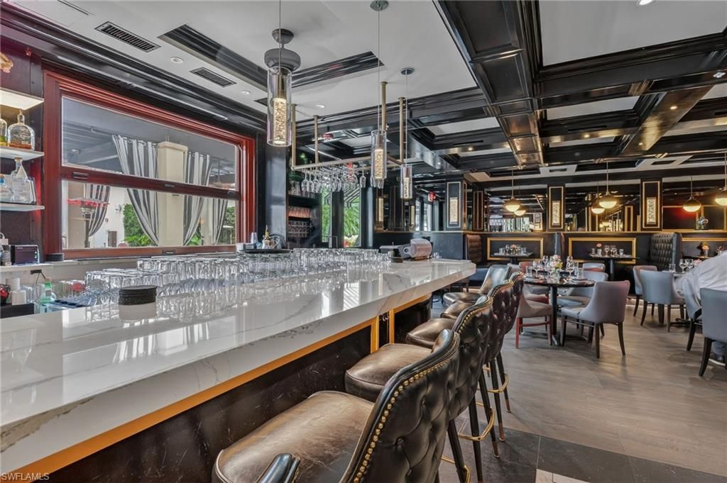 Photo of 221 9th ST S #114, NAPLES, FL 34102 (MLS # 226010460)