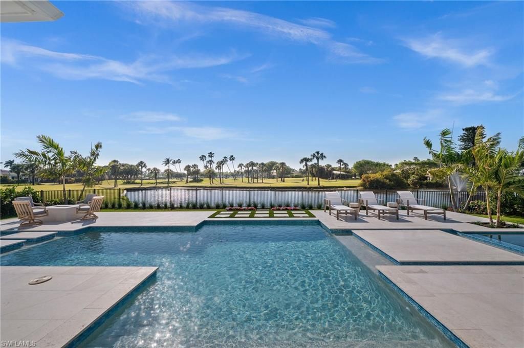 Photo of 809 Wedge DR, NAPLES, FL 34103 (MLS # 225083591)