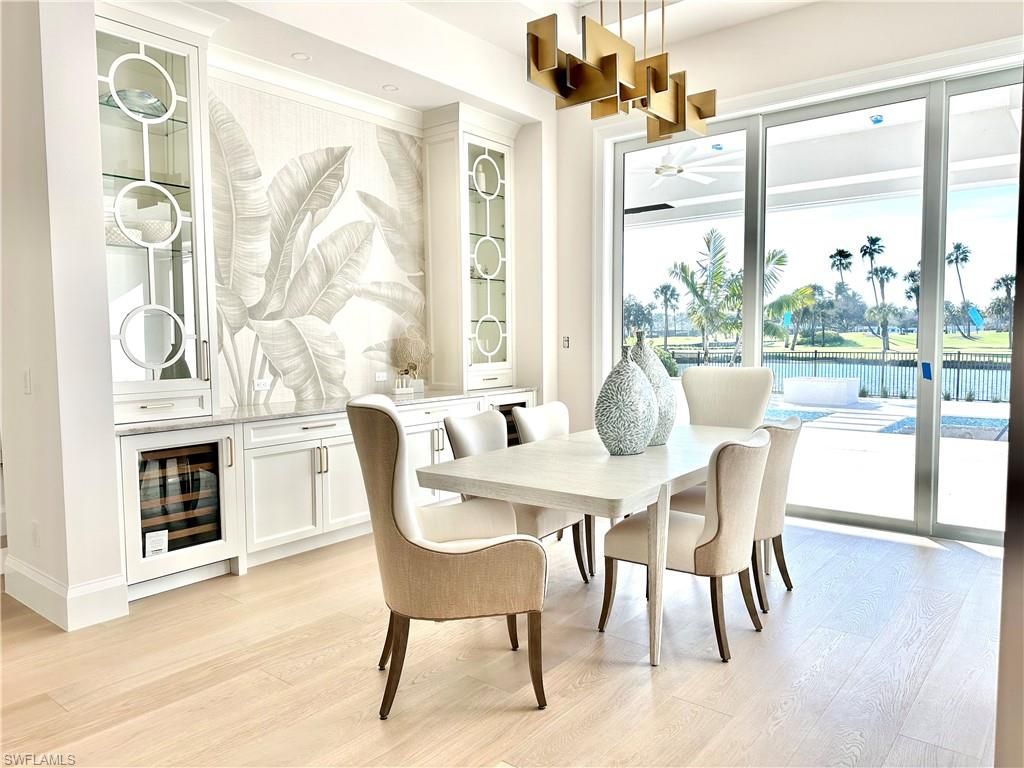 Photo of 809 Wedge DR, NAPLES, FL 34103 (MLS # 225083591)