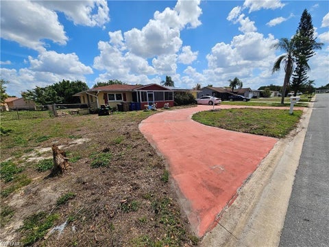 Photo of 116 Rowland RD, LEHIGH ACRES, FL 33936 (MLS # 226037300)