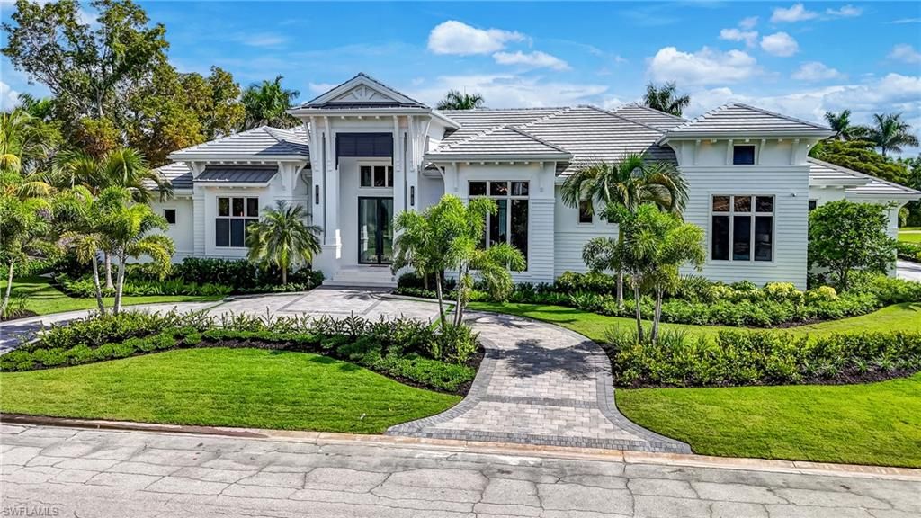 Photo of 710 Willowhead DR, NAPLES, FL 34103 (MLS # 225073371)