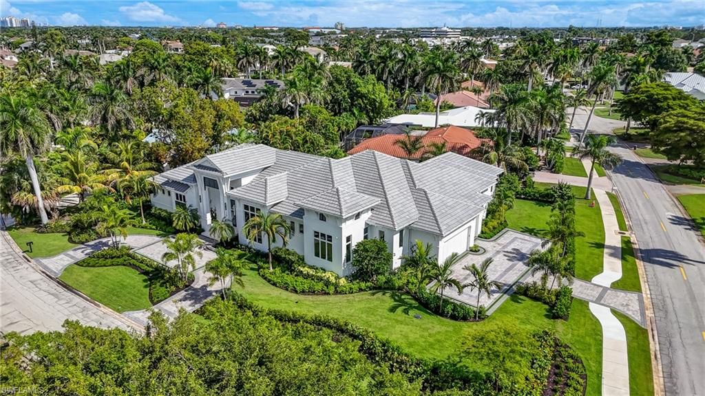 Photo of 710 Willowhead DR, NAPLES, FL 34103 (MLS # 225073371)