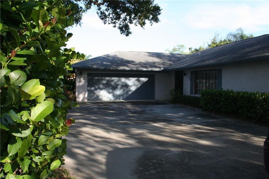 Location! Location! Location!  Single family pool/spa home for sale in Pinewoods!  Pinewoods is located in the heart of Naples close to everything Naples has to offer, A-rated school zone, low HOA fee non-gated community.  Concrete/Block/Stucco construction, corner lot with circular driveway with mature trees and landscaping, oversized 2 car garage 25x26, 3 bedroom, 2.5 bath, 1869 sq. ft under air, heated pool/spa with screened lanai.  Shingle Re-roof completed 2013, pool re-surfaced in past 2 years.  Irrigation on a well, city water & sewer.